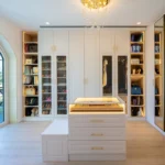 How to Plan a Home Renovation Project in Dubai: 2026 Guide Luxury home renovation in Dubai featuring an elegant walk-in closet with custom cabinetry and a chandelier.