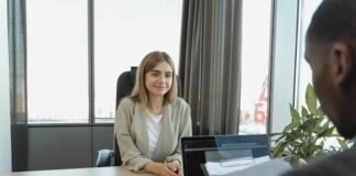 How Job Transfers Affect Long-Term Living Plans in the Region A woman having an interview